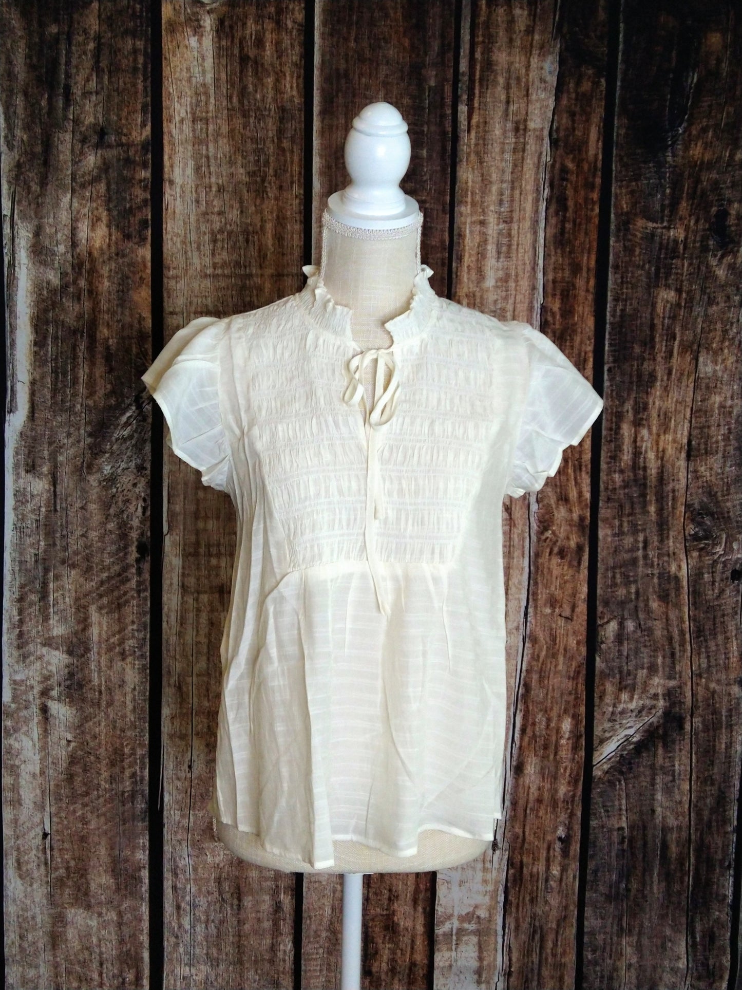 Ivory smocked neckline top